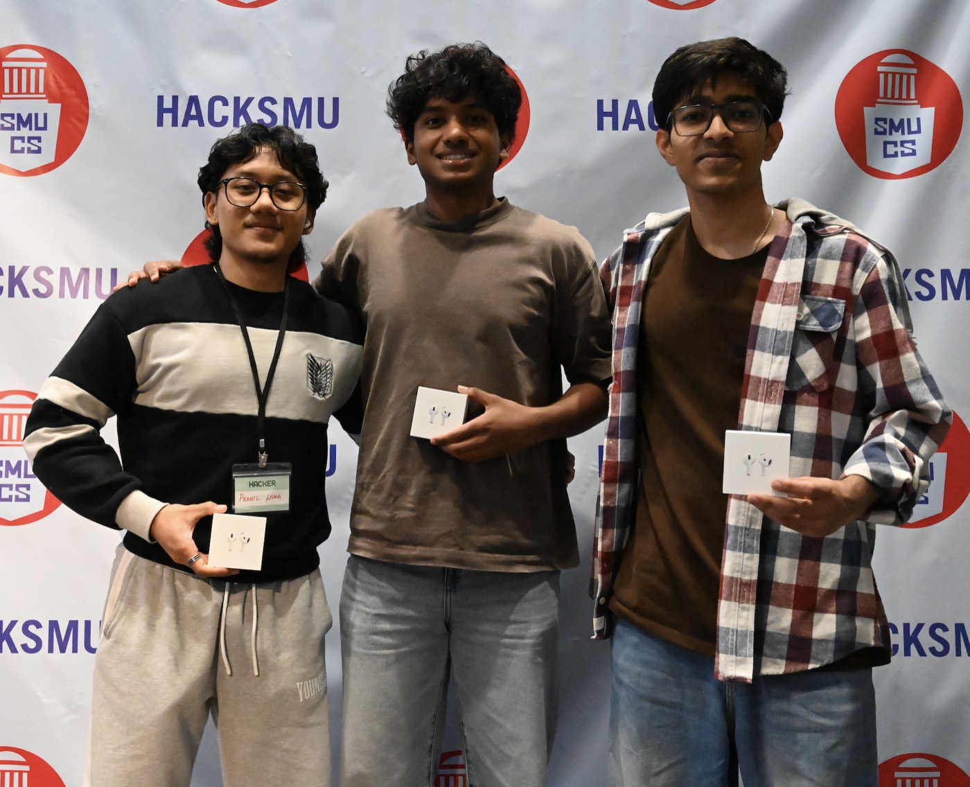 Prize ceremony with teammates at HackSMU